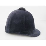A velvet covered peak riding hat as made by S Patey, size 6 1/2.