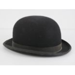 A Lock & Co London felt bowler hat, size 7 1/4.