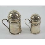 Two HM silver miniature pepperettes in the form of flour castors,