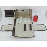 A G.H. Mumm canvas and leather champagne expedition kit complete with embossed brown leather G.H.