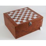 A chequer top faux walnut lidded box having under-drawer containing a full set of wooden chess