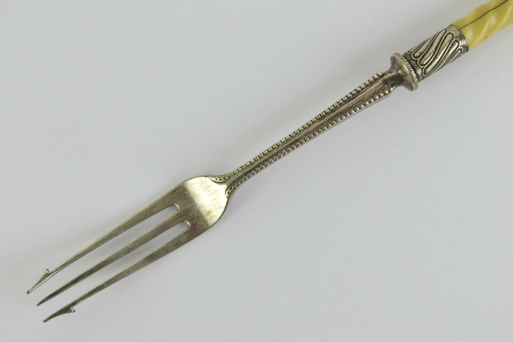 A pickle fork having twist carved ivory handle and white metal fittings, 23cm in length. - Image 3 of 3