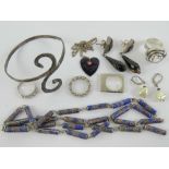A quantity of assorted silver and white metal jewellery including sterling silver bangle,