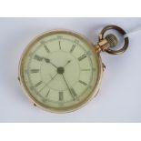 A 14k gold top wind pocket watch having Swiss movement marked H White 104 Market Street Manchester,
