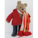 A vintage Paddington Bear teddy bear with duffel coat and boots, a/f, standing 46cm high.
