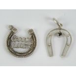 A silver 'Good Luck' horse shoe charm or pendant,