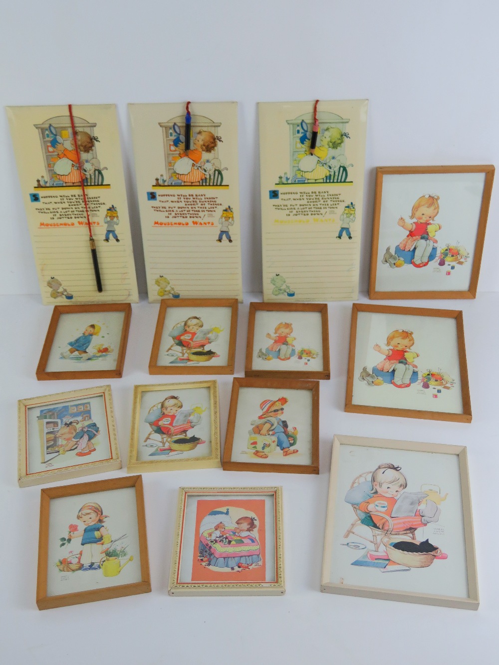 Mabel Lucie Attwell; a collection of framed prints, three measuring 20 x 14.