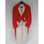 A Tipperary Hunt MFH hunting pink tailcoat having full complement of twelve (6+6) brass buttons.
