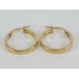 A pair of 9ct gold hoop earrings, marked 375 Italy, 1.2g.