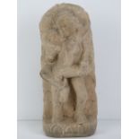 A hand carved stone figurine of Indo Asian erotic influence showing the union between man and woman,