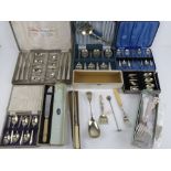 A quantity of assorted silver plated cutlery inc various box sets.