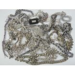 A quantity of assorted white metal chains, bracelets, etc.