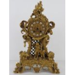 A superb gilt brass 19th century Continental mantle clock by E Pannard having hand painted ceramic
