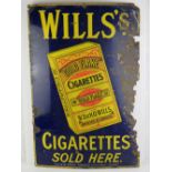 A vintage enamelled tinplate advertising sign 'Wills's Wild Gold Flake Cigarettes',