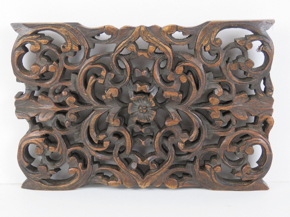 A carved Indo Asian wooden wall plaque having coiled serpent upon, 30 x 17cm high. - Image 3 of 3