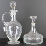 A heavy flat bottom glass decanter with stopper, 23cm high,