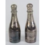 A pair of miniature silver plated champagne bottles by Parks of London,