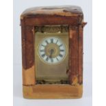 A fine five glass French made carriage clock enamelled chapter ring with Roman numerals,