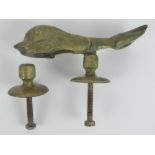 A heavy cast brass door knocker in two sections, in the form of a mythological sea creature,