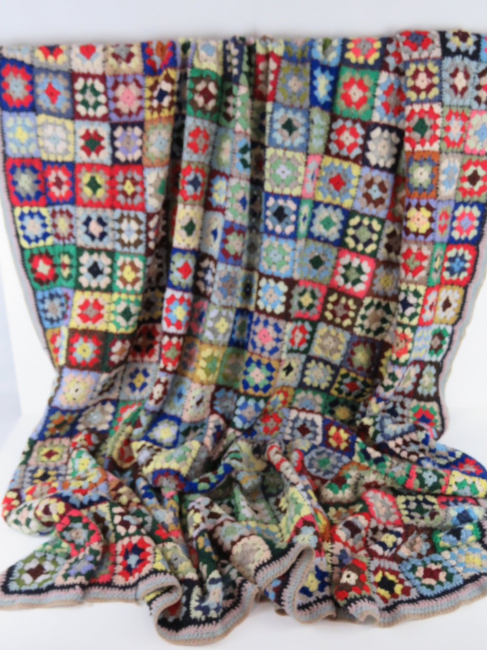 A vintage hand crochet Welsh blanket having 361 floral squares, 140 x 140cm.