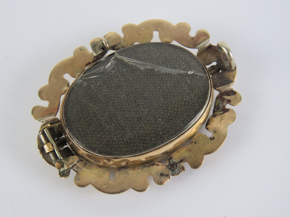 A Victorian pinchbeck spinning fob brooch having woven blonde hair to one side, - Image 2 of 2