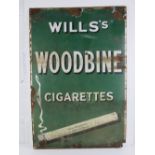 A vintage enamelled tinplate advertising sign 'Wills's Woodbine Cigarettes', measuring 92 x 61cm.