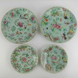 A quantity of assorted famille rose plates; two 18cm dia, one 25cm dia and one 26cm dia.