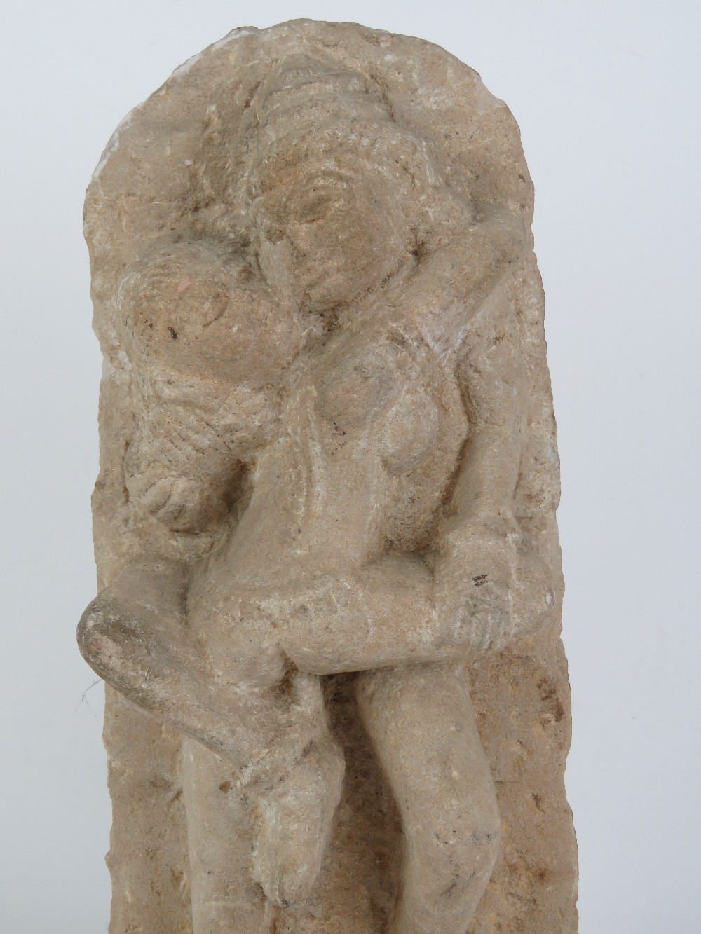 A hand carved stone figurine of Indo Asian erotic influence showing the union between man and woman, - Image 4 of 4