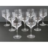 A set of nine wine glasses each standing 15.5cm high.