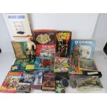 A quantity of vintage toys and puzzles including two Action Man dolls,