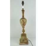 A large and impressive brass and onyx table lamp base of baluster form over stepped base,