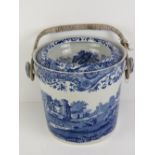 A blue and white Copeland Spode slop pail having wickerwork handle.