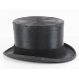 A silk top hat size by S Patey, leather sweatband, size 7.25.
