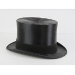 A William Anderson Edinburgh and Glasgow silk top hat, size 7.25.
