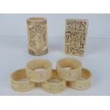 A 19th century carved ivory cylindrical brush pot, 9 x 5cm.