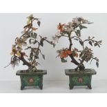Two cloissone footed planter pots, each having decorative leaves made of amethyst, carnelian,