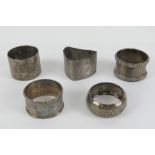Five assorted HM silver napkin rings, various patterns, three hallmarked for Birmingham 1896,