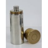 A spirit flask in the form of a shotgun cartridge, silver plated, pewter and brass, 15cm high.