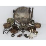 A quantity of assorted metalware including; silver plated tray, four wine coasters, toast rack,
