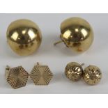 A pair of 9ct gold domed stud earrings, hallmarked 375,