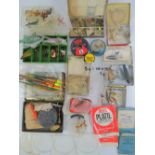 A quantity of assorted vintage sea, course and fly fishing gear including; flies, fly tins, hooks,