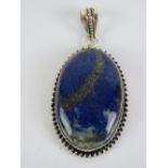 A large lapis lazuli pendant stamped 925 measuring 6cm inc bale.