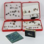 A quantity of vintage fishing flies within two plastic cases,