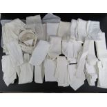 A large quantity of assorted white riding stocks, Moss Bros collars, etc.