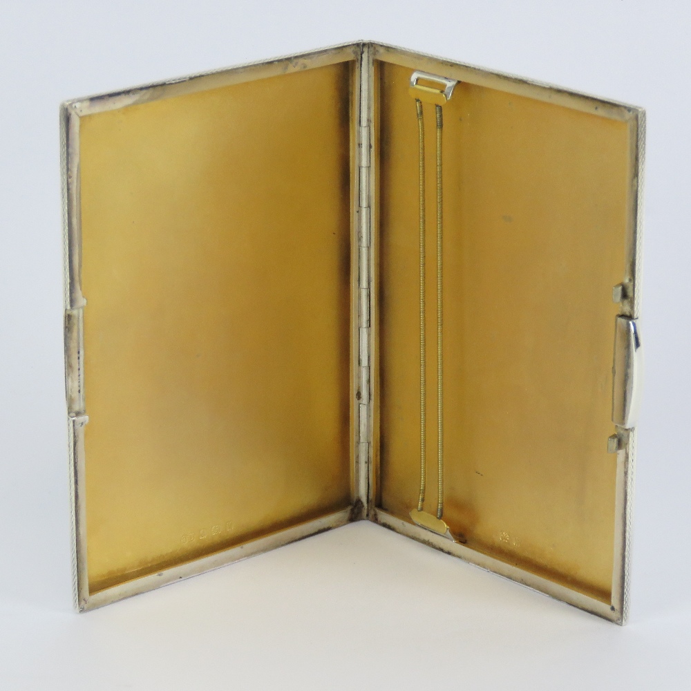 A hallmark silver cigarette case having engine turned engraved pattern throughout, gilt interior, - Image 4 of 4