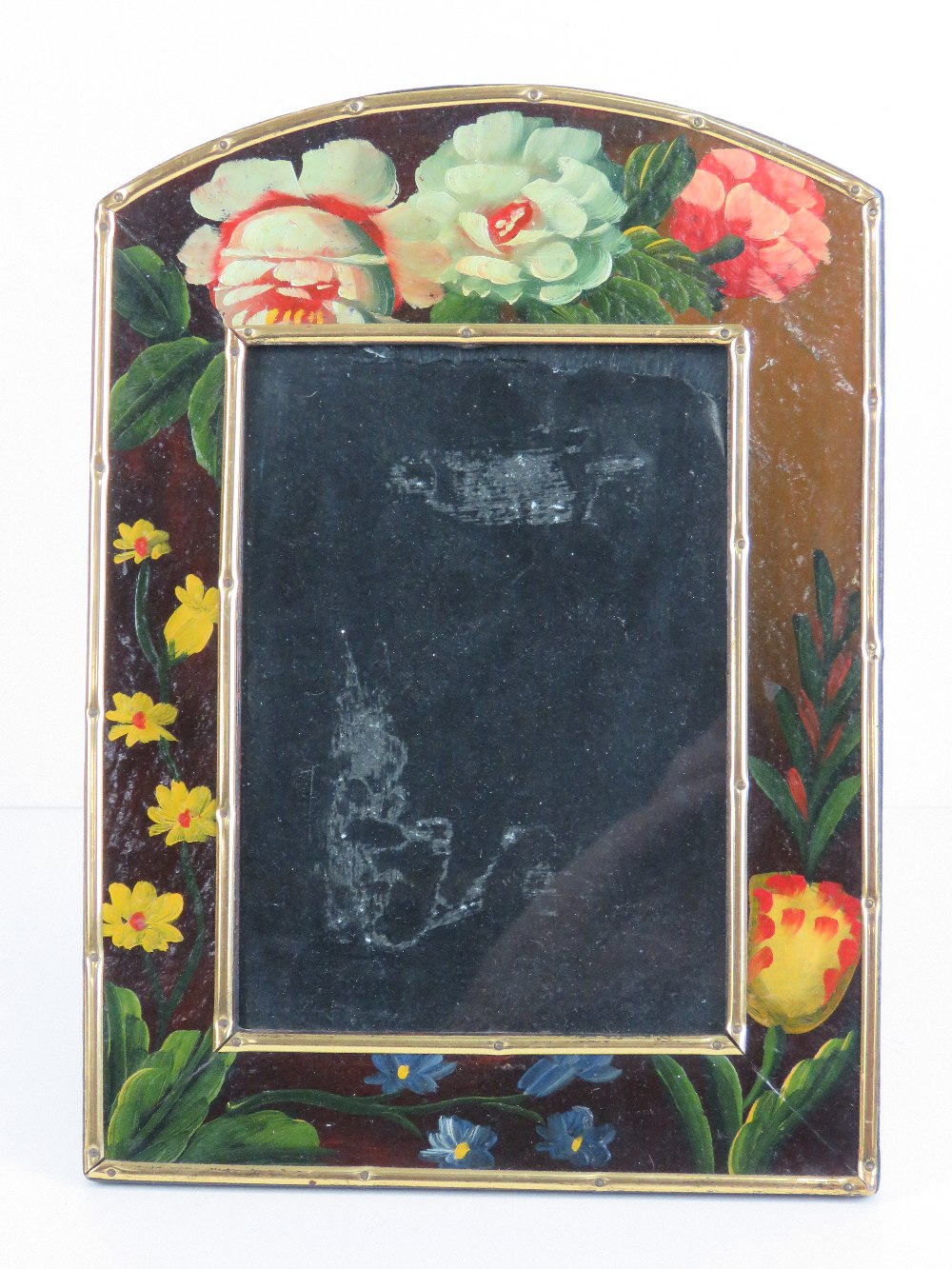 A delightful handpainted easel photograph frame having barge ware style floral decoration,