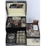 A quantity of assorted silver and costume jewellery within a faux crocodile skin jewellery box,