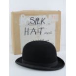 A Herbert Johnson London felt bowler hat, size 7 1/4, with makers cardboard box with label upon.