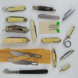 A quantity of thirteen assorted pocket and pen knives including mother of pearl,