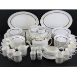 A large Susie Cooper Design dinner service made by Wedgwood including serving plates, dinner plates,
